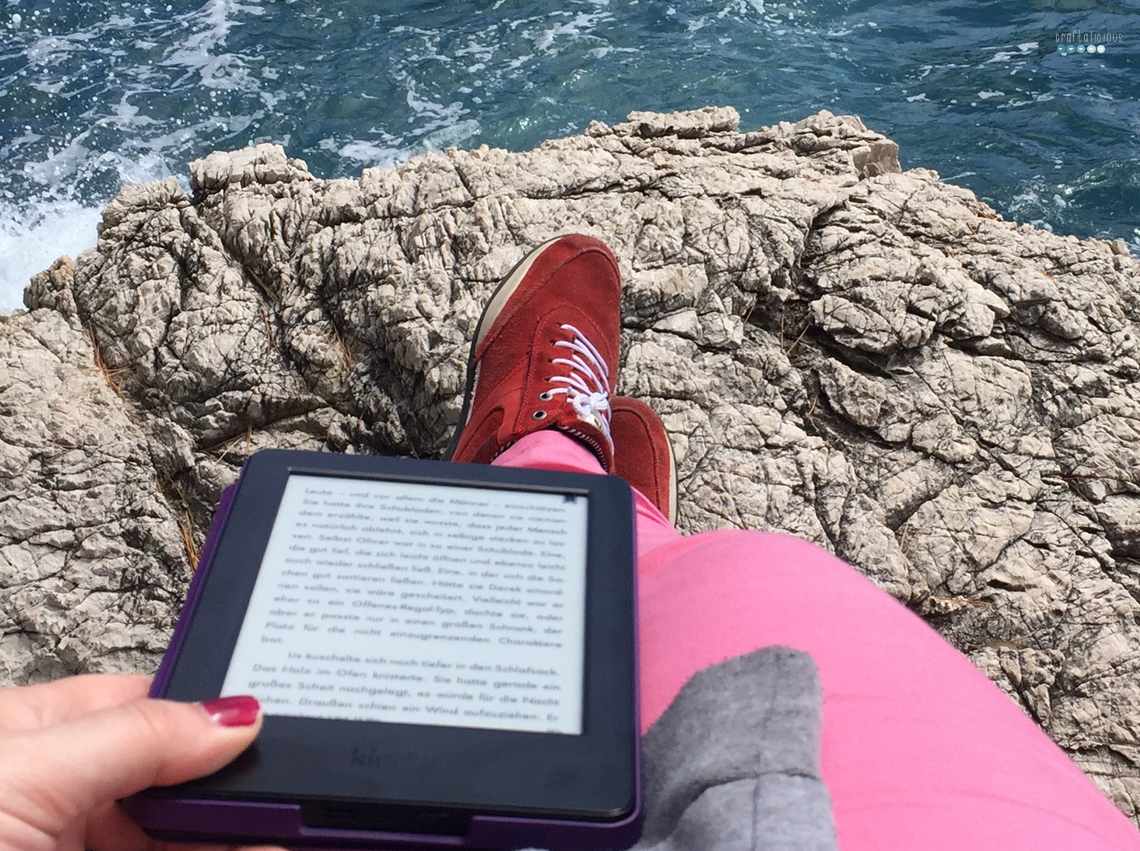 reading at the ocean