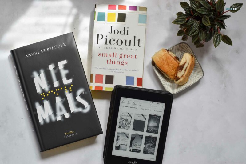 flatly with books I read in June with cinnamon rolls and plant by craftaliciousme creative lifestyleblog