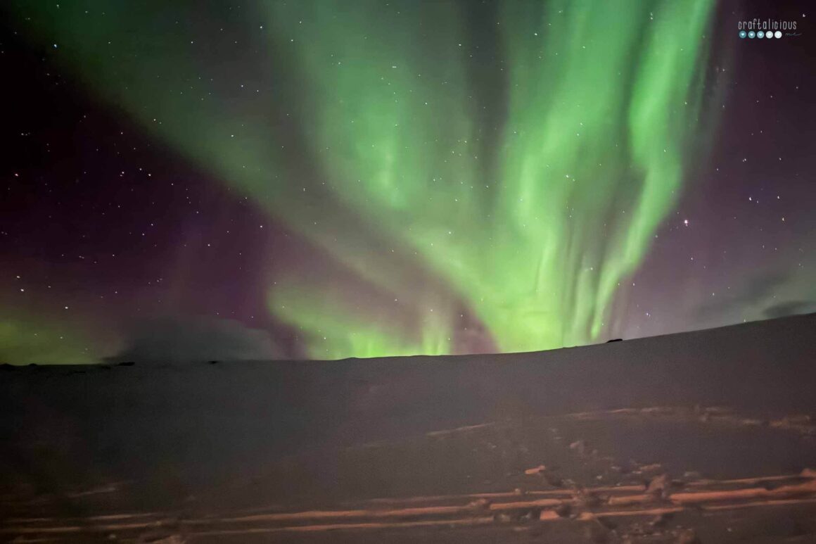Arctic Adventure Polar Lights over snow