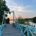 blue bridge over water ways with sunset sky – at the moment